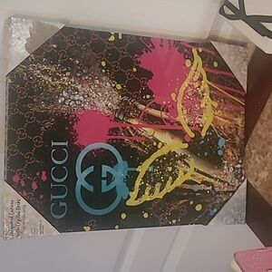 Gucci wall art with crystal rocks